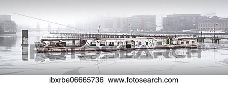 Winter, snow and ice at the old passenger ship MS Dr. Ingrid Wengler on the river Spree in Osthafen, Berlin, Germany, Europe View Large Photo Image Stock Photograph - Winter, snow and ice at the old passenger ship MS Dr. Ingrid Wengler on the river Spree in Osthafen, Berlin, Germany, Europe. Fotosearch