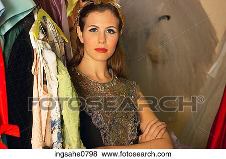 Actress relaxing in costume closet View Large Photo Image Stock Photo - Actress relaxing in costume closet. Fotosearch