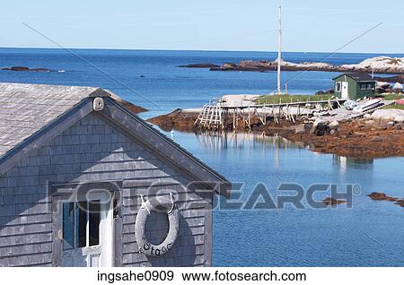 Boat houses along seashore View Large Photo Image Stock Photo - Boat houses along seashore. Fotosearch