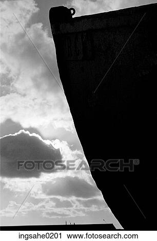 Bow of old boat silhouetted against sky View Large Photo Image Stock Image - Bow of old boat silhouetted against sky . Fotosearch