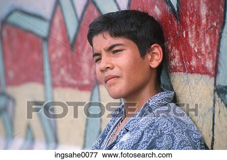 Boy leaning on wall 0001 View Large Photo Image Stock Photo - Boy leaning on wall 0001. Fotosearch
