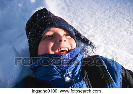 Boy on snow 0003 View Large Photo Image Stock Image - Boy on snow 0003. Fotosearch