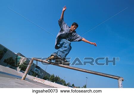 Stock Image - Boy with roller-skates 0001. Fotosearch