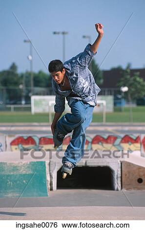 Boy with roller-skates 0021 View Large Photo Image Stock Photograph - Boy with roller-skates 0021. Fotosearch
