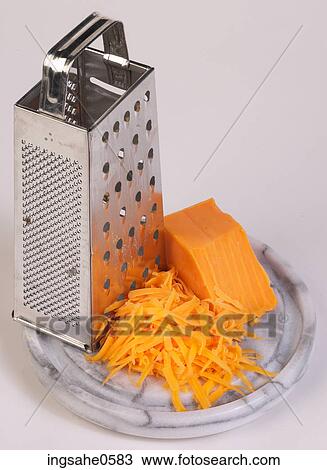 Cheddar cheese and grater on marble plate L2 View Large Photo Image Stock Image - Cheddar cheese and grater on marble plate L2. Fotosearch