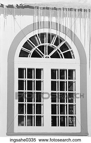 Stock Photography - Church window with icicles . Fotosearch