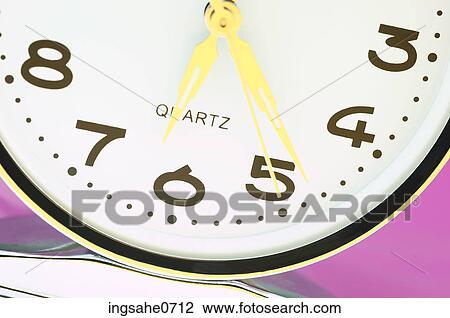 Clock with yellow hands View Large Photo Image Stock Image - Clock with yellow hands. Fotosearch