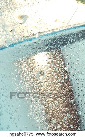 Close up of condensation on glass of water View Large Photo Image Stock Photography - Close up of condensation on glass of water. Fotosearch