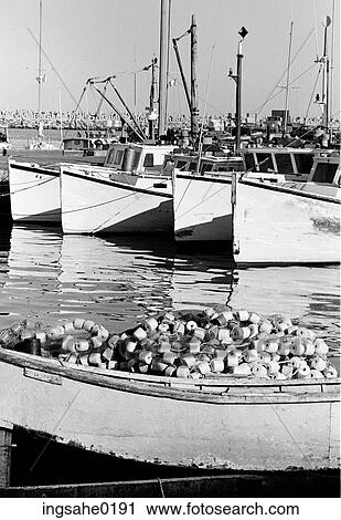 Stock Image - Commercial fishing boats at dock . Fotosearch