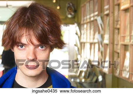 Stock Photography - Customer in music store 0004. Fotosearch