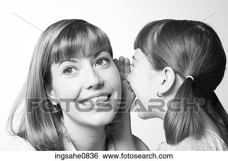 Daughter telling her mother a secret 1 View Large Photo Image Stock Photograph - Daughter telling her mother a secret 1. Fotosearch
