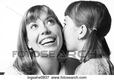 Daughter telling her mother a secret 2 View Large Photo Image Stock Photo - Daughter telling her mother a secret 2. Fotosearch