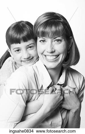 Embracing mother and daughter 1 View Large Photo Image Picture - Embracing mother and daughter 1. Fotosearch