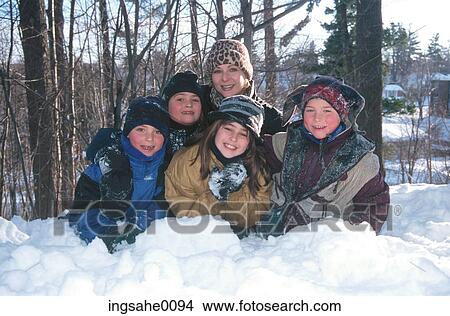 Family sitting on snow 0001 View Large Photo Image Picture - Family sitting on snow 0001. Fotosearch