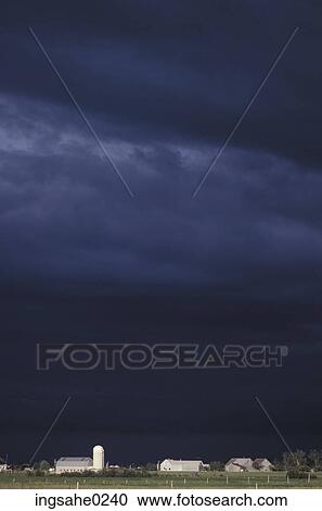 Farm under threatening sky View Large Photo Image Stock Image - Farm under threatening sky . Fotosearch