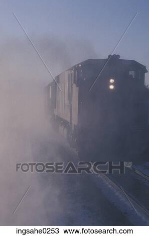 Freight train in mist View Large Photo Image Stock Image - Freight train in mist . Fotosearch