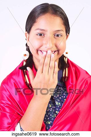 Stock Photo - Giggling little girl wearing First Nation outfit 5k2. Fotosearch