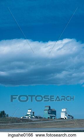 Grain elevators on horizon View Large Photo Image Stock Photograph - Grain elevators on horizon . Fotosearch