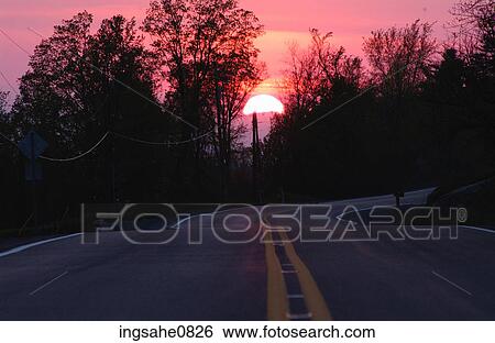 Highway at sunset View Large Photo Image Stock Photograph - Highway at sunset. Fotosearch