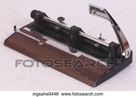 Hole punch L2 View Large Photo Image Stock Photo - Hole punch L2. Fotosearch