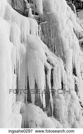 Large amounts of ice on rocks View Large Photo Image Stock Photo - Large amounts of ice on rocks . Fotosearch