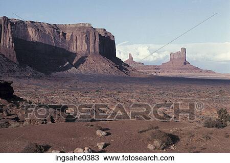 Stock Image - Large buttes in desert . Fotosearch