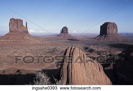 Stock Image - Large buttes in desert . Fotosearch