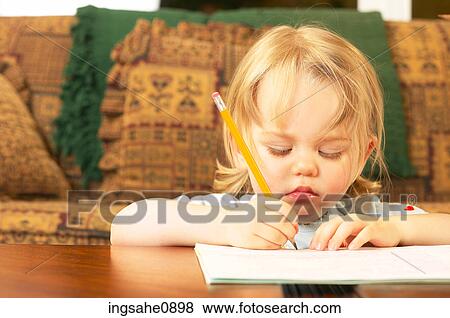 Stock Photo - Little girl drawing a picture 4. Fotosearch