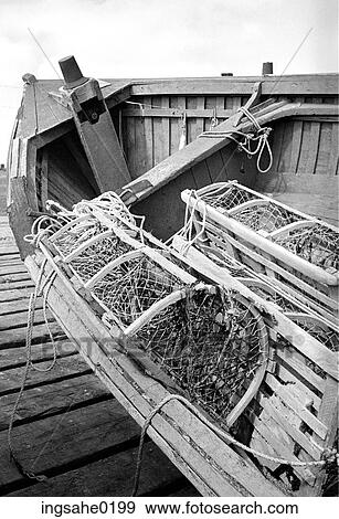 Lobster traps in lobster boat View Large Photo Image Stock Photo - Lobster traps in lobster boat . Fotosearch