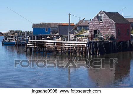 Lobster traps on wooden Maritime dock View Large Photo Image Stock Photo - Lobster traps on wooden Maritime dock. Fotosearch
