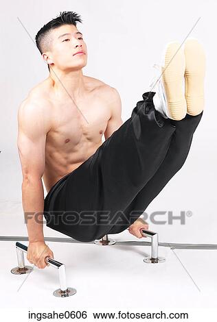 Stock Photograph - Man doing gymnastics. Fotosearch