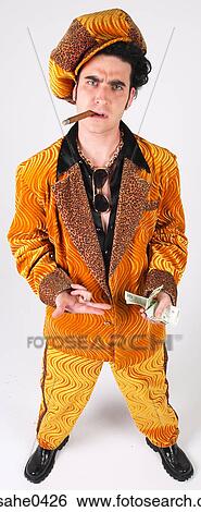 Man in orange suit and hat with cash View Large Photo Image Stock Photograph - Man in orange suit and hat with cash. Fotosearch