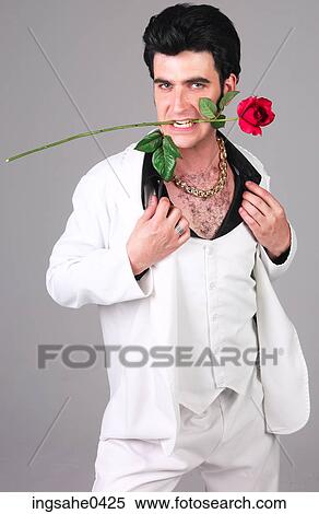 Man in white tuxedo with red rose 1 View Large Photo Image Stock Photography - Man in white tuxedo with red rose 1. Fotosearch