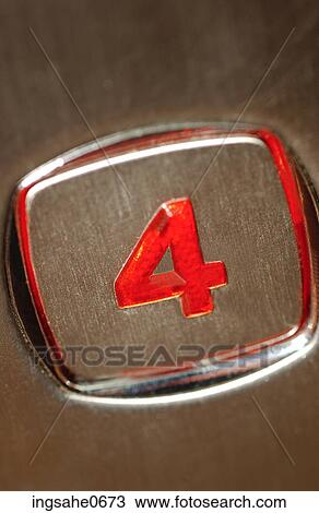 Stock Image - Number four on elevator button. Fotosearch
