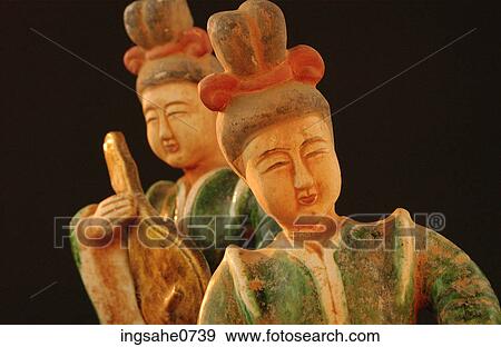 Painted wooden Asian figurines 1 View Large Photo Image Stock Photo - Painted wooden Asian figurines 1. Fotosearch