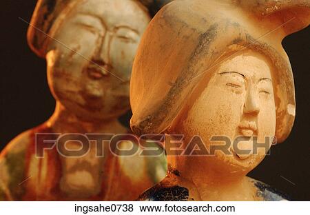 Painted wooden Asian figurines View Large Photo Image Stock Photo - Painted wooden Asian figurines. Fotosearch