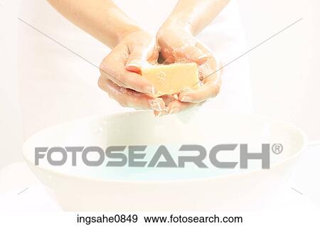 Person washing their hands with bar of soap 4 View Large Photo Image Stock Photo - Person washing their hands with bar of soap 4. Fotosearch