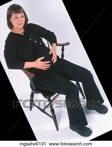 pregnant woman holding stomach 7 View Large Photo Image Stock Image - pregnant woman holding stomach 7. Fotosearch
