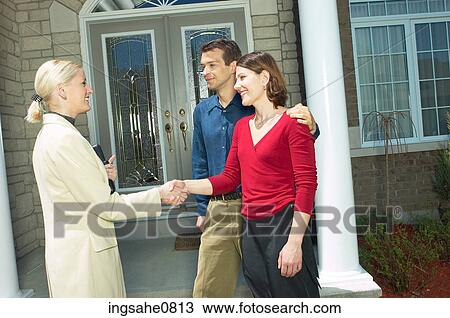 Real estate owner selling home to young couple 2 View Large Photo Image Stock Image - Real estate owner selling home to young couple 2. Fotosearch