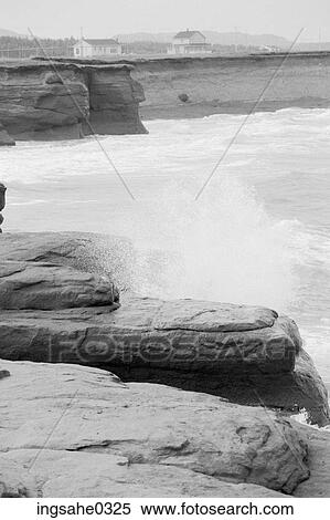 Rocky coastline with houses View Large Photo Image Stock Photography - Rocky coastline with houses . Fotosearch
