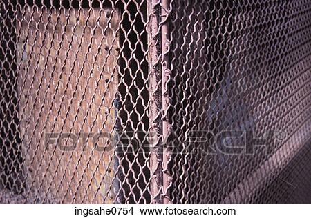 Picture - Rusty chain link fence. Fotosearch
