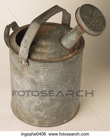 Stock Photograph - Rusty steel watering can L1. Fotosearch