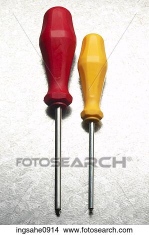 Screwdrivers with red and yellow plastic handles View Large Photo Image Picture - Screwdrivers with red and yellow plastic handles. Fotosearch
