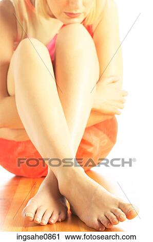 Seated barefoot woman View Large Photo Image Stock Image - Seated barefoot woman. Fotosearch