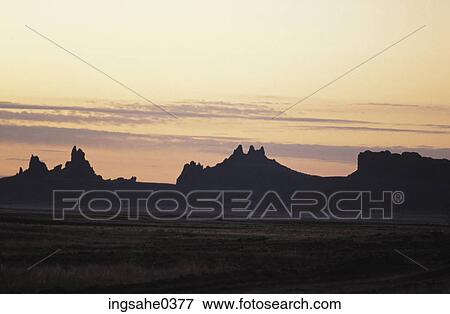 Silhouette of desert mountains View Large Photo Image Stock Photo - Silhouette of desert mountains . Fotosearch