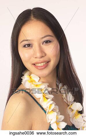 Smiling girl wearing lei 1 View Large Photo Image Stock Photograph - Smiling girl wearing lei 1. Fotosearch