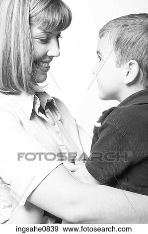 Smiling mother and son View Large Photo Image Stock Photo - Smiling mother and son. Fotosearch