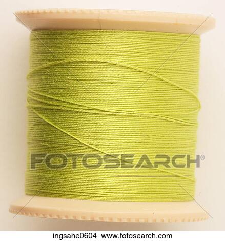 Spool of green thread L2 View Large Photo Image Picture - Spool of green thread L2. Fotosearch