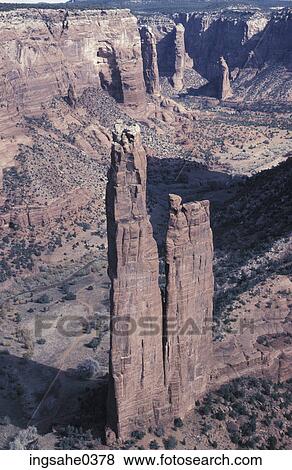 Tall rock formations View Large Photo Image Stock Photo - Tall rock formations . Fotosearch