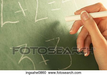 Teacher writing math equation on chalkboard 1 View Large Photo Image Stock Image - Teacher writing math equation on chalkboard 1. Fotosearch